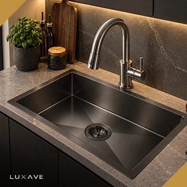 LUXAVE Quartz Kitchen Sink in black on a marble countertop